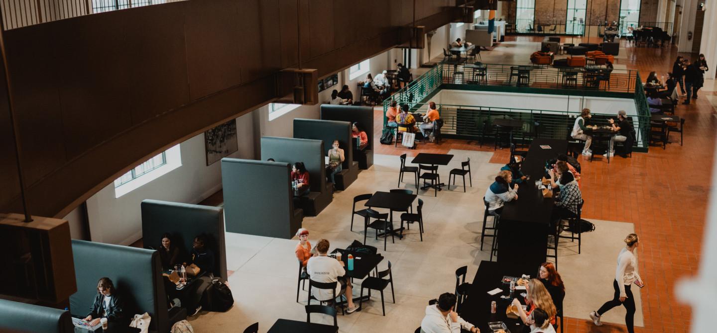 Students having lunch and studying in the Powerhouse.